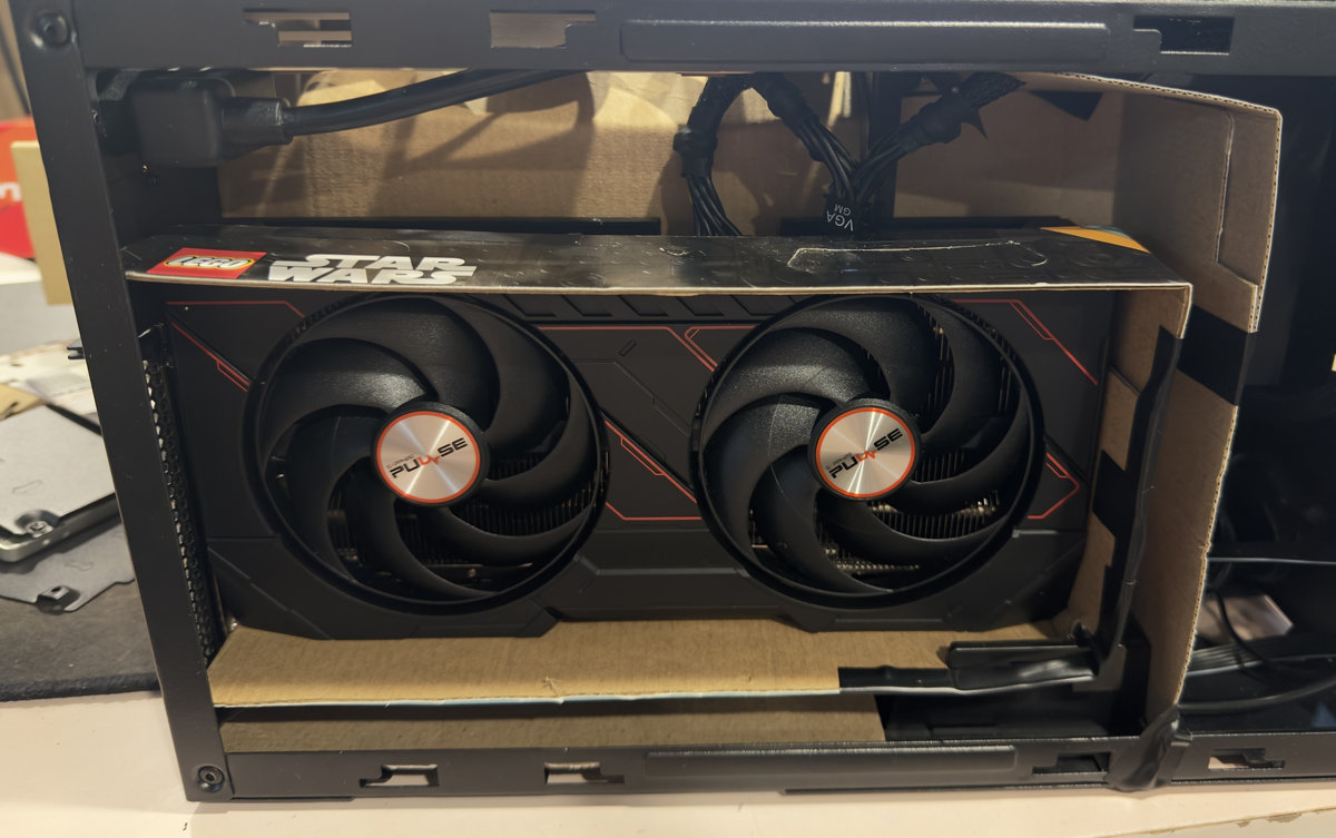 photograph of a custom PC inside a Silverstone Sugo S14 case with the side panel removed